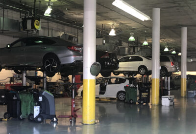 Cars being worked on at auto shop